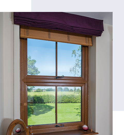The inside of an oak coloured window